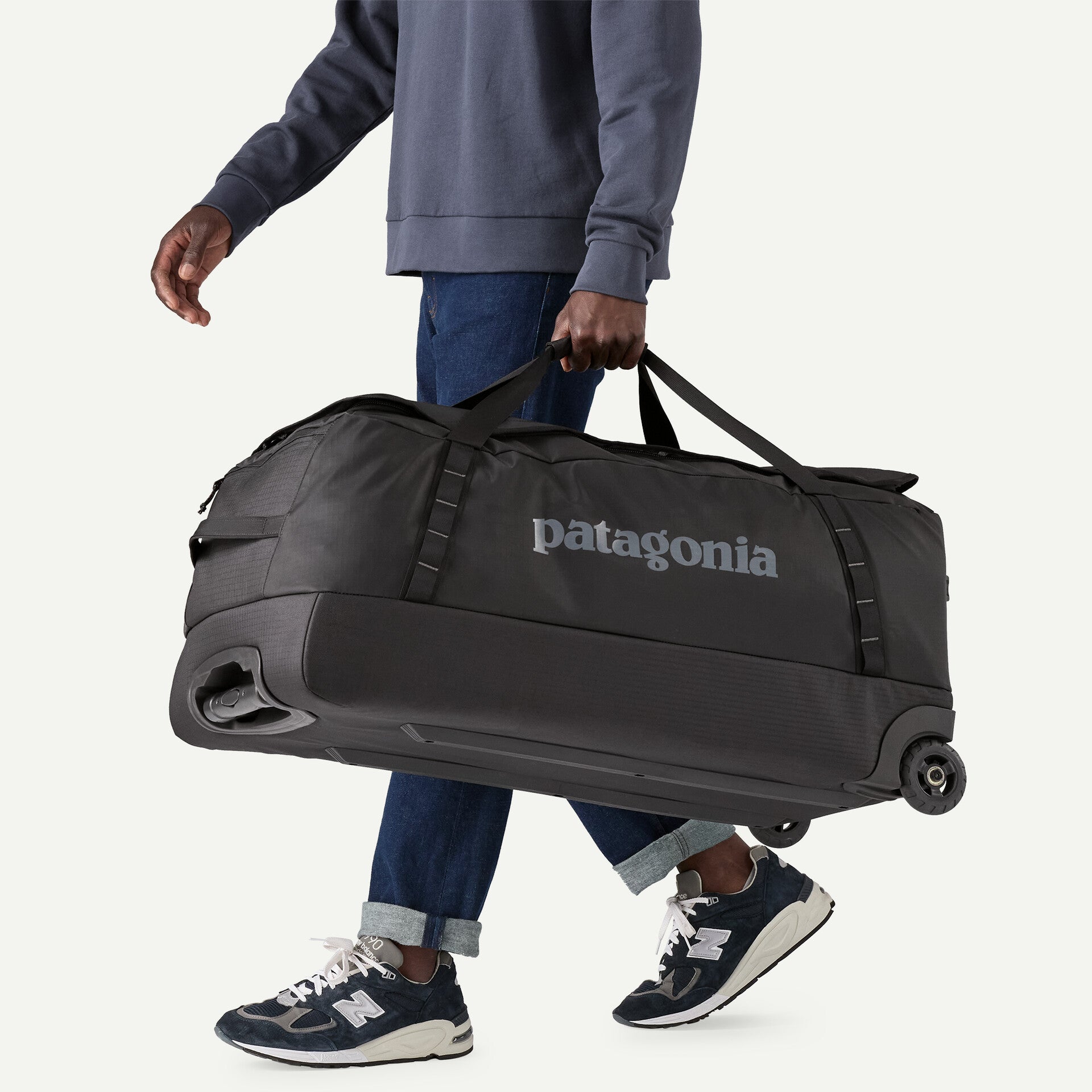 Black Hole Wheeled Duffel 100L